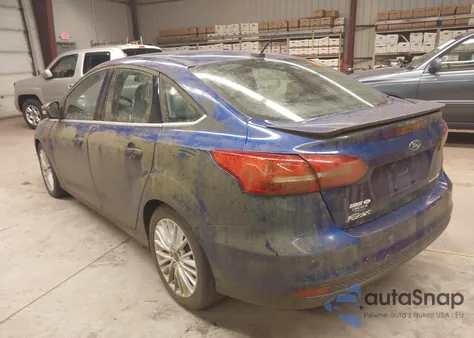 2015 Ford Focus Titanium from USA, damaged, VIN 1FADP3J28FL380815